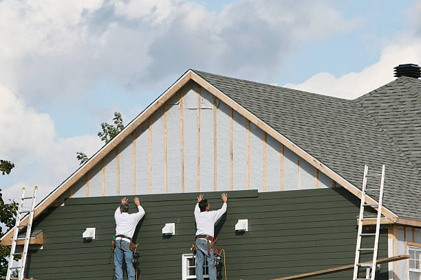 Professional Siding Installation technician working in Bradenville, PA